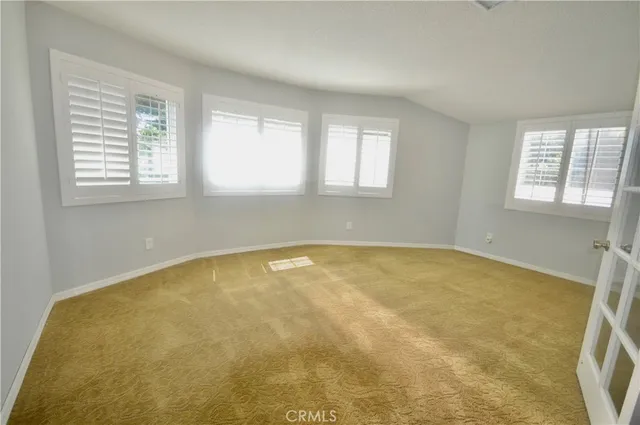 a view of a room with a window