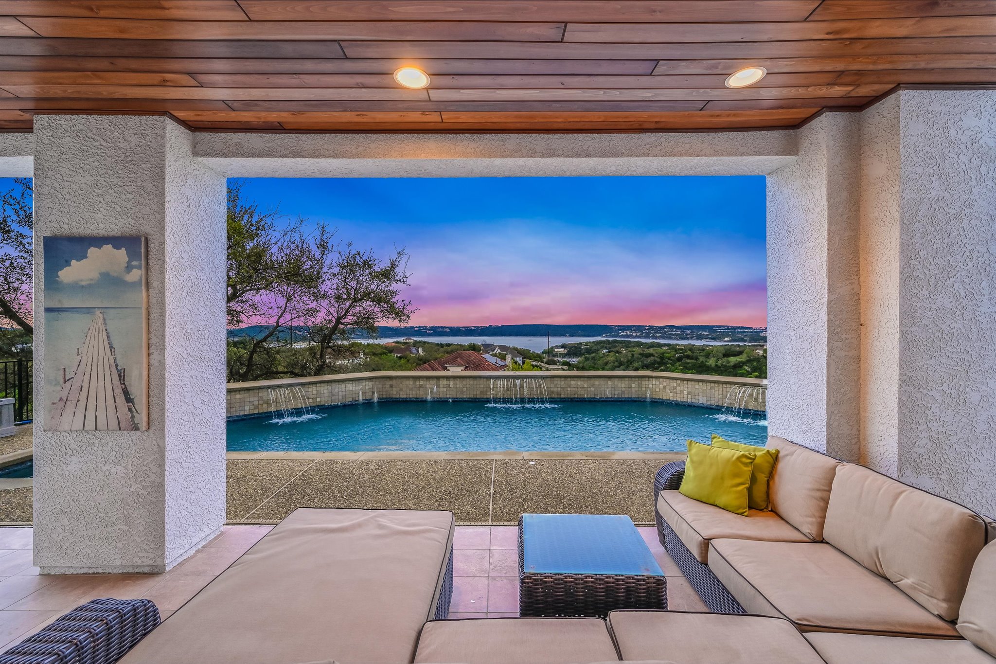 4319 Rum Runner Road Austin, TX 78734 - Photo 4 of 40 Pool at dusk featuring outdoor seating, an outdoor pool, and a patio area