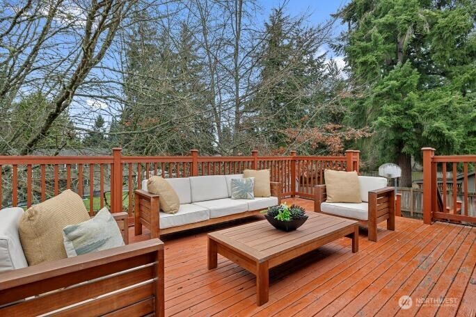 5527 153rd Street Southwest Edmonds, WA 98026 - Photo 17 of 40 a outdoor living room with furniture and wooden floor