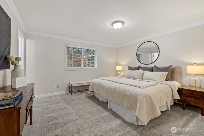 5527 153rd Street Southwest Edmonds, WA 98026 - Photo 19 of 40 a bedroom with a bed and a fish aquarium