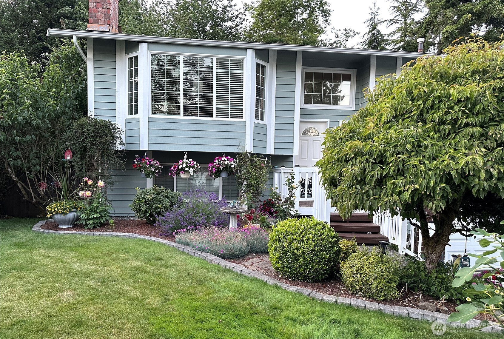 5527 153rd Street Southwest Edmonds, WA 98026 - Photo 38 of 40 front view of a house with a yard