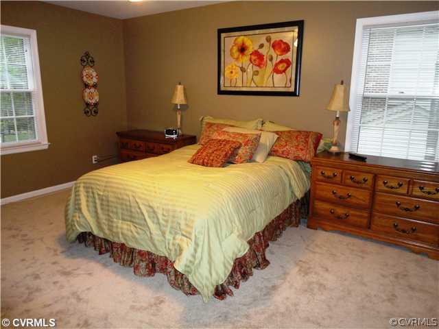 10649 Honey Tree Road Richmond, VA 23235 - Photo 6 of 12 Bedroom - Bedroom has new wall to wall carpet, ceiling fan with light and a double closet. The master bedroom has a large walk-in closet and a double closet.