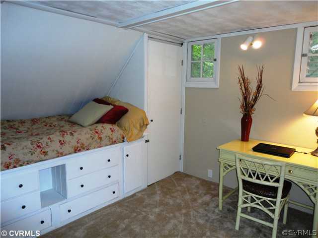10649 Honey Tree Road Richmond, VA 23235 - Photo 10 of 12 Bedroom - A nook and cranny style bedroom with built-ins.