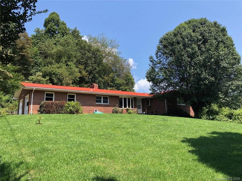 152 Willis Hill Road Canton, NC 28716 - Photo 1 of 34 a view of a house with a yard