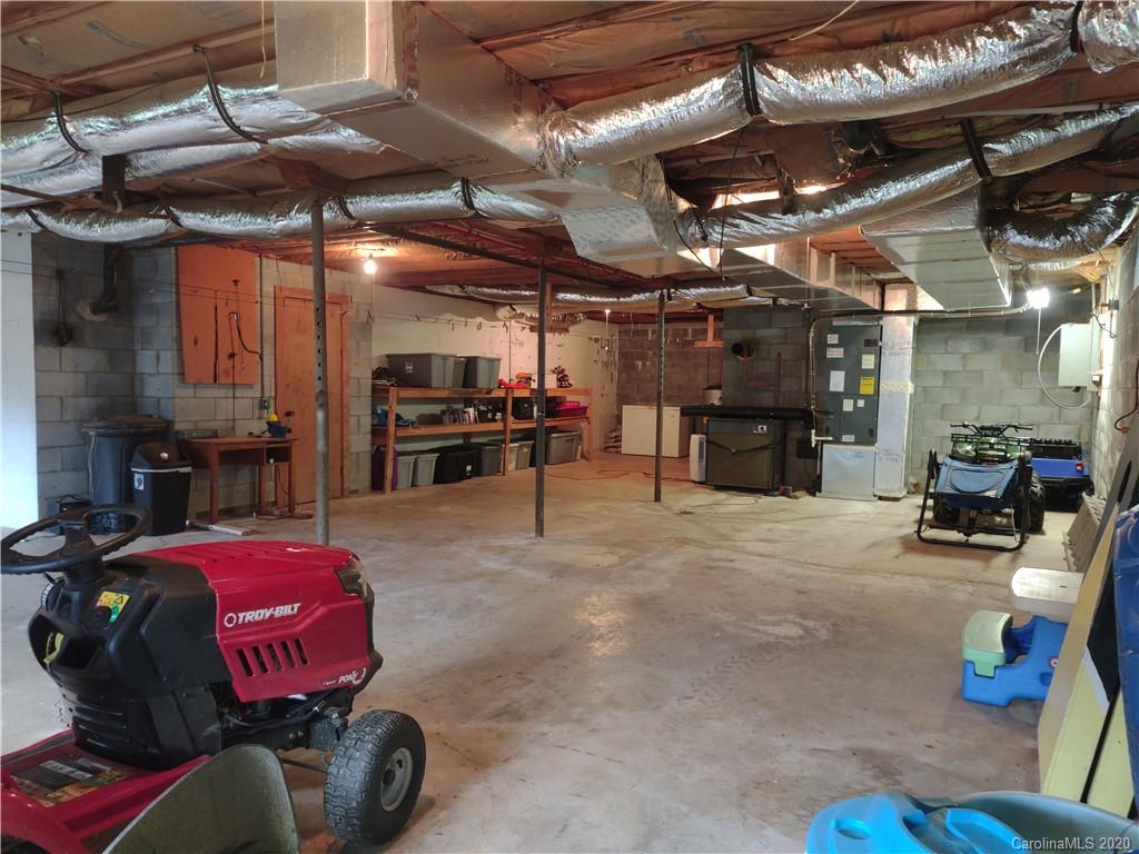 152 Willis Hill Road Canton, NC 28716 - Photo 18 of 34 a view of a storage room with utility area