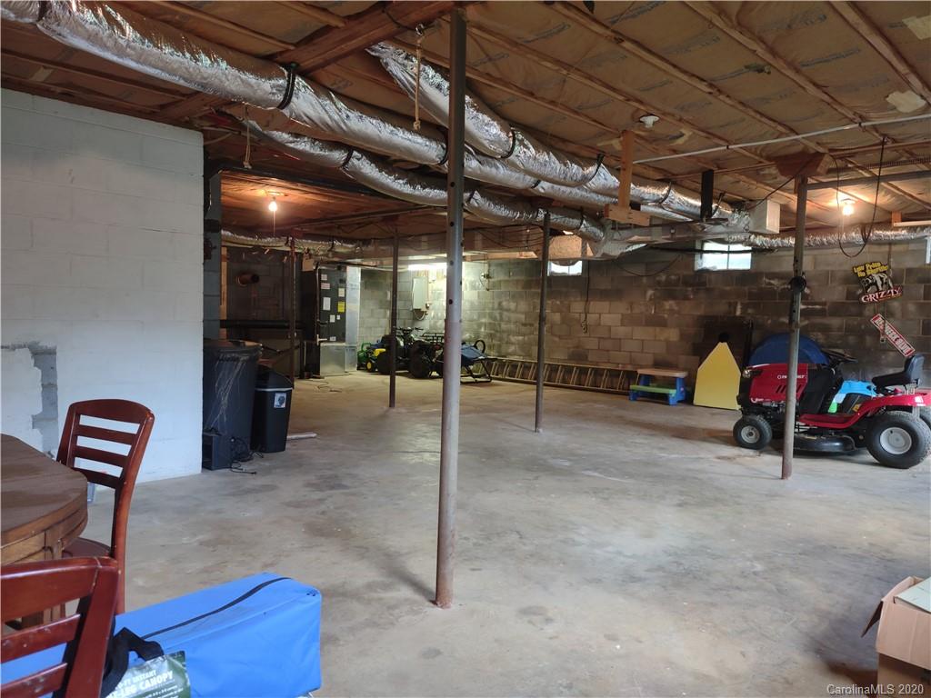 152 Willis Hill Road Canton, NC 28716 - Photo 21 of 34 a view of a garage with gym equipment