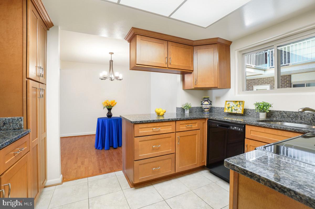 3346 Chiswick Court, Unit 581B Silver Spring, MD 20906 - Photo 16 of 49 Kitchen - Adjoining Dining Room
