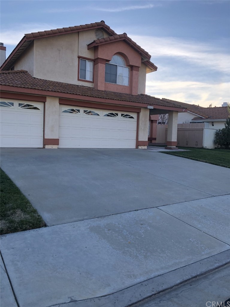 a house view with a outdoor space