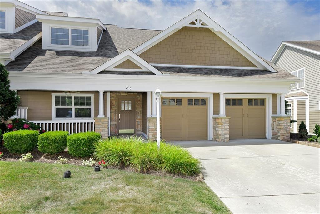 236 Berkeley Way Monroeville, PA 15146 - Photo 1 of 1 a front view of a house with garden