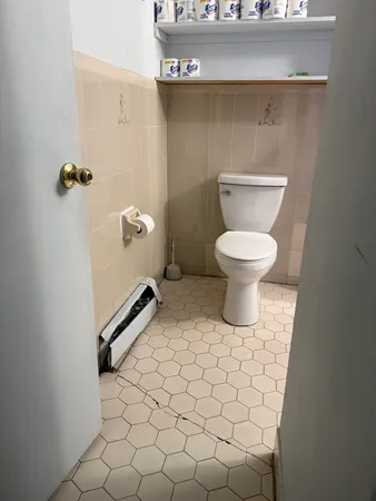 a bathroom with a toilet