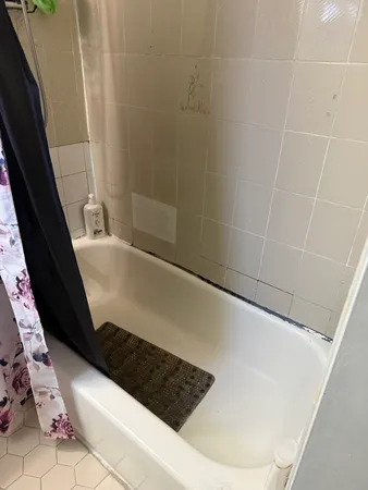 a bathroom with a bathtub