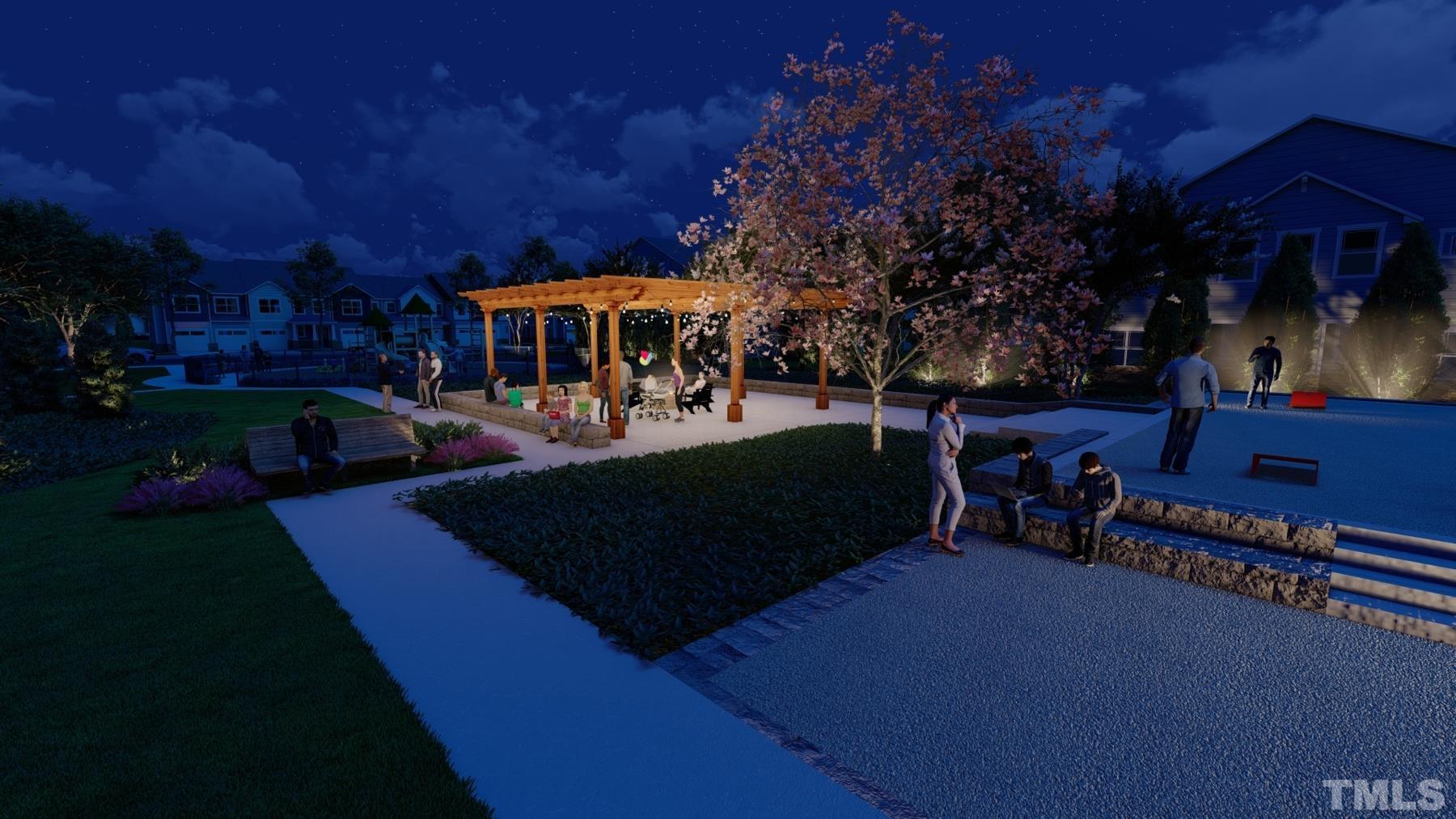 120 Yulan Way Garner, NC 27529 - Photo 22 of 30 a view of a yard with plants and a bench