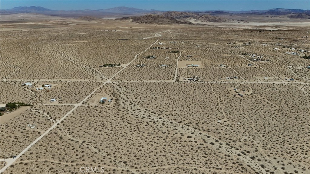775 Manzanita Road Landers, CA 92285 - Photo 2 of 15 a view of a bathroom with a shower