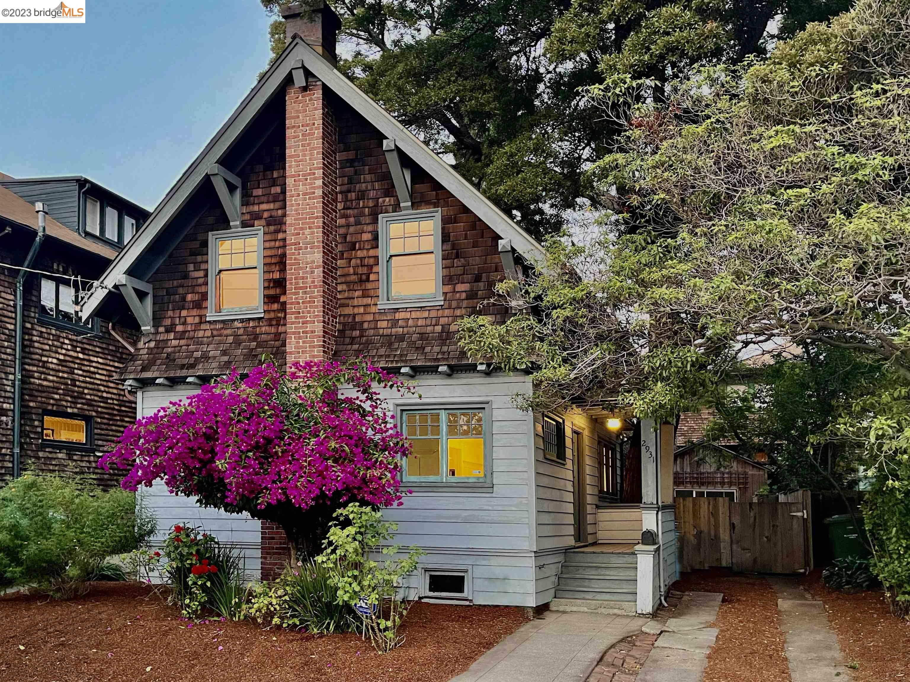 2931 Florence Street Berkeley, CA 94705 - Photo 1 of 1 a view of a house with a flower garden