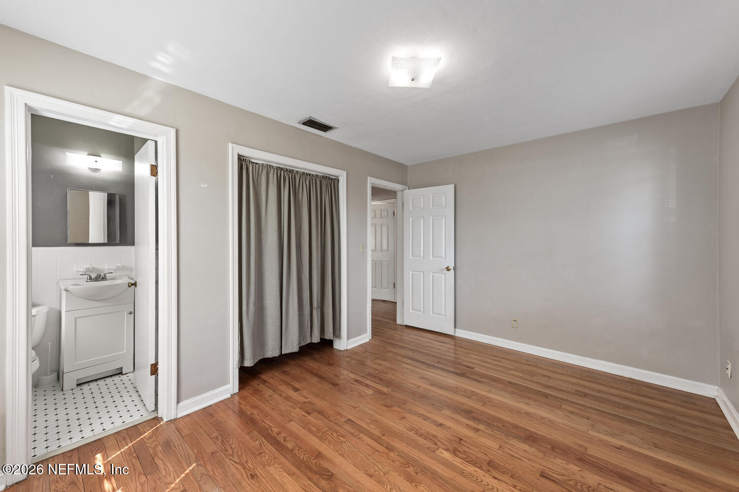 8309 Calento Street Jacksonville, FL 32211 - Photo 16 of 25 wooden floor in an empty room
