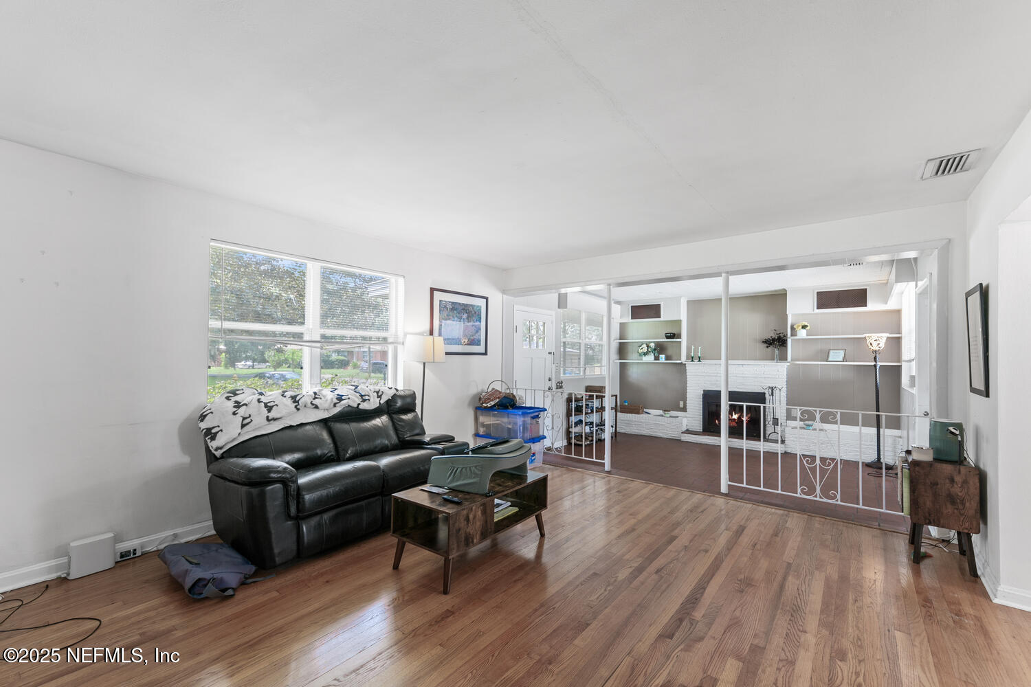 8309 Calento Street Jacksonville, FL 32211 - Photo 7 of 22 a living room with furniture and wooden floor