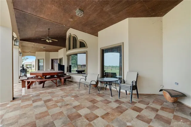 a outdoor space with lots of tables and chairs