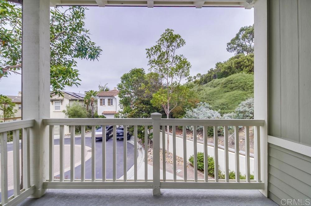 501 Beach Street Encinitas, CA 92024 - Photo 13 of 16 a balcony with wooden floor