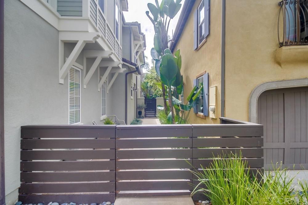 501 Beach Street Encinitas, CA 92024 - Photo 2 of 16 a view of staircase with wooden floor and a window