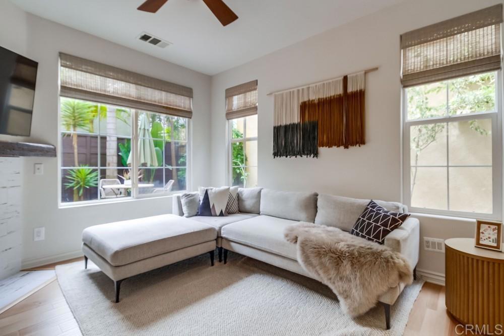 501 Beach Street Encinitas, CA 92024 - Photo 8 of 16 a living room with furniture and a flat screen tv