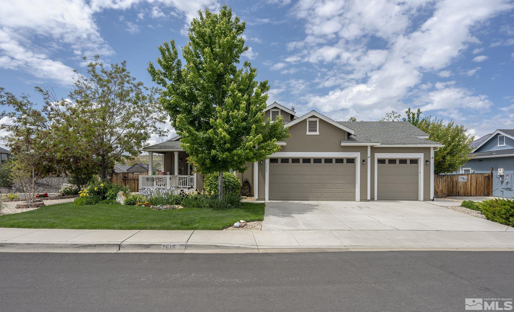 7615 Crest Bluff Drive Reno, NV 89506 - Photo 1 of 32 a view of house with a garden and pathway