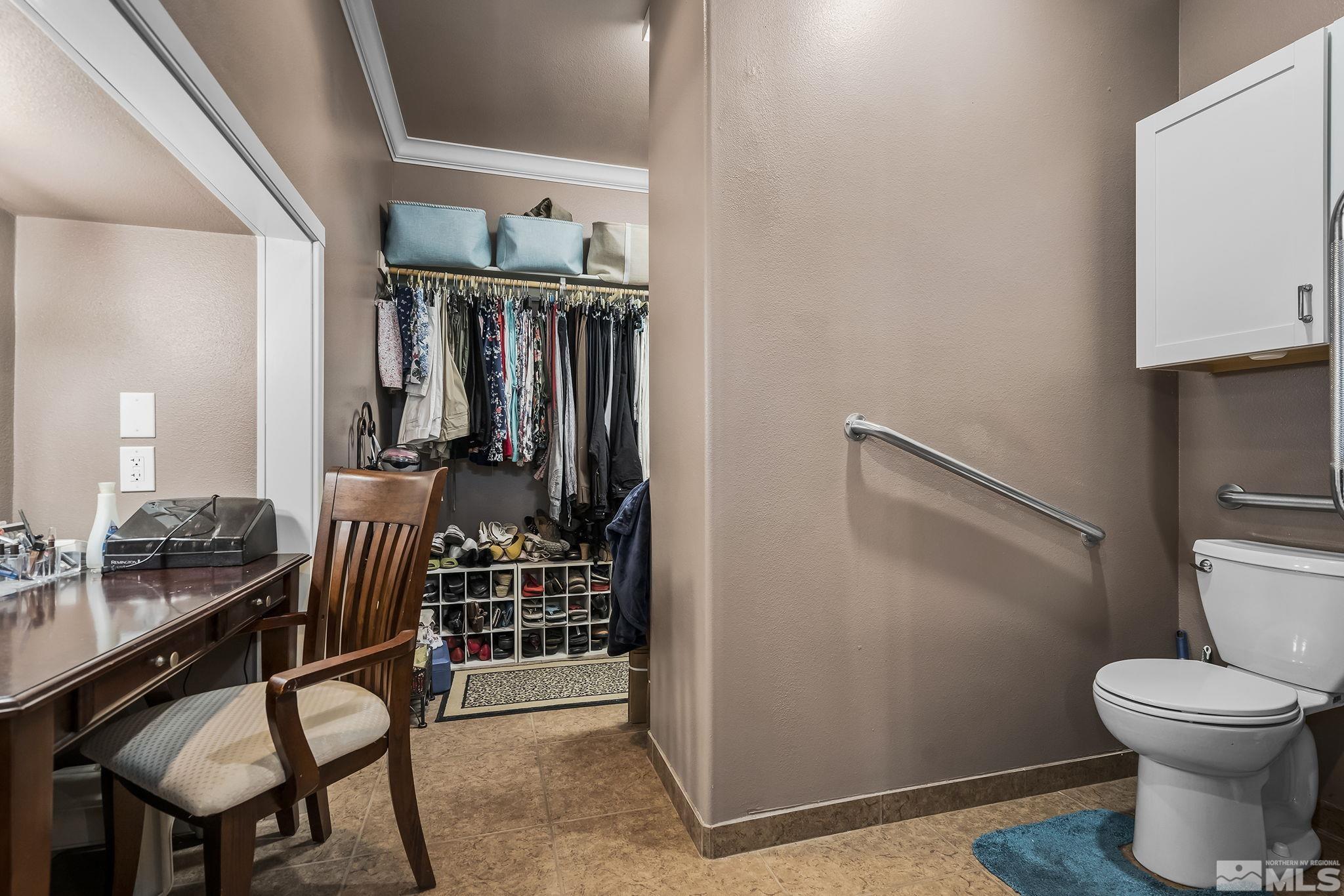 7615 Crest Bluff Drive Reno, NV 89506 - Photo 15 of 32 a view of a hallway with furniture and outdoor views