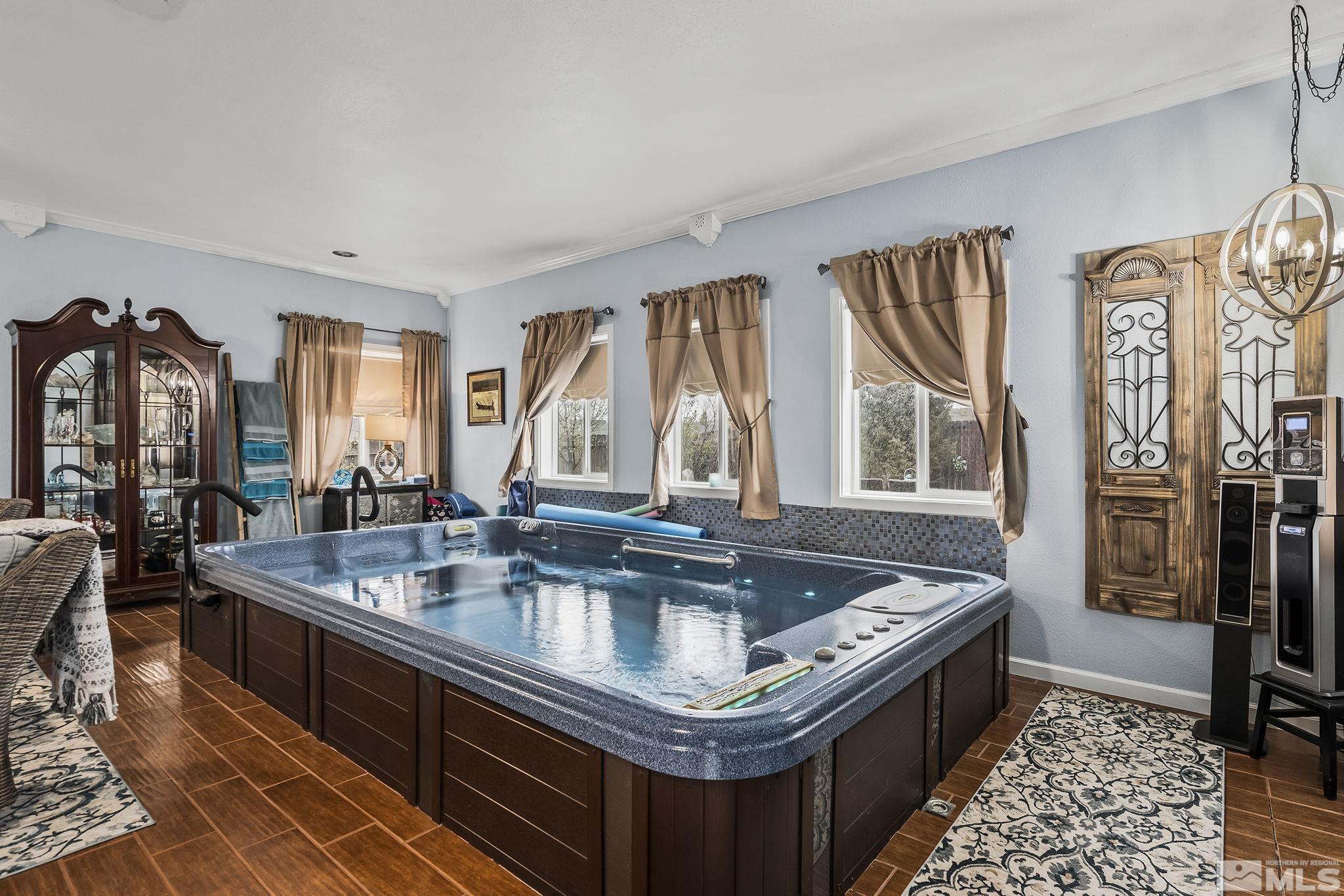 7615 Crest Bluff Drive Reno, NV 89506 - Photo 18 of 32 a kitchen with granite countertop a sink and a stove