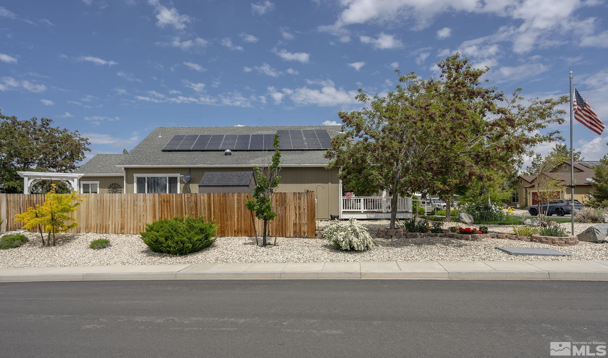 7615 Crest Bluff Drive Reno, NV 89506 - Photo 24 of 32 a cars parked in front of a building