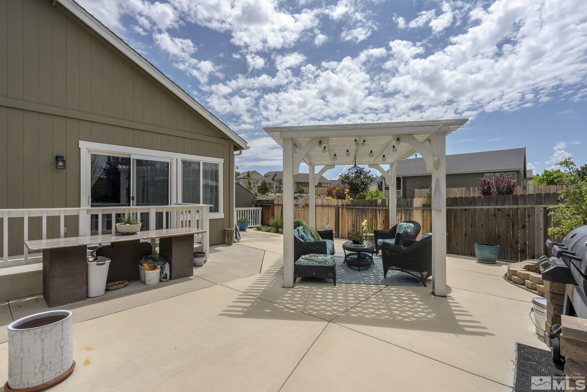7615 Crest Bluff Drive Reno, NV 89506 - Photo 25 of 32 a view of living room filled with furniture and large window
