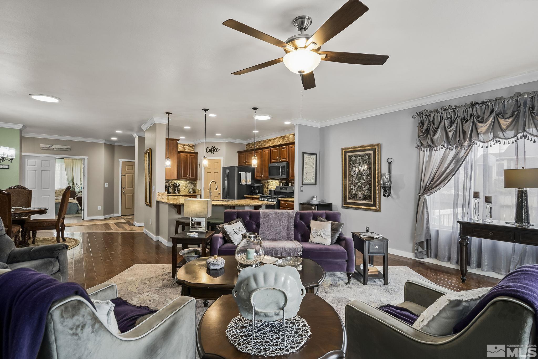 7615 Crest Bluff Drive Reno, NV 89506 - Photo 7 of 32 a living room with furniture and kitchen view
