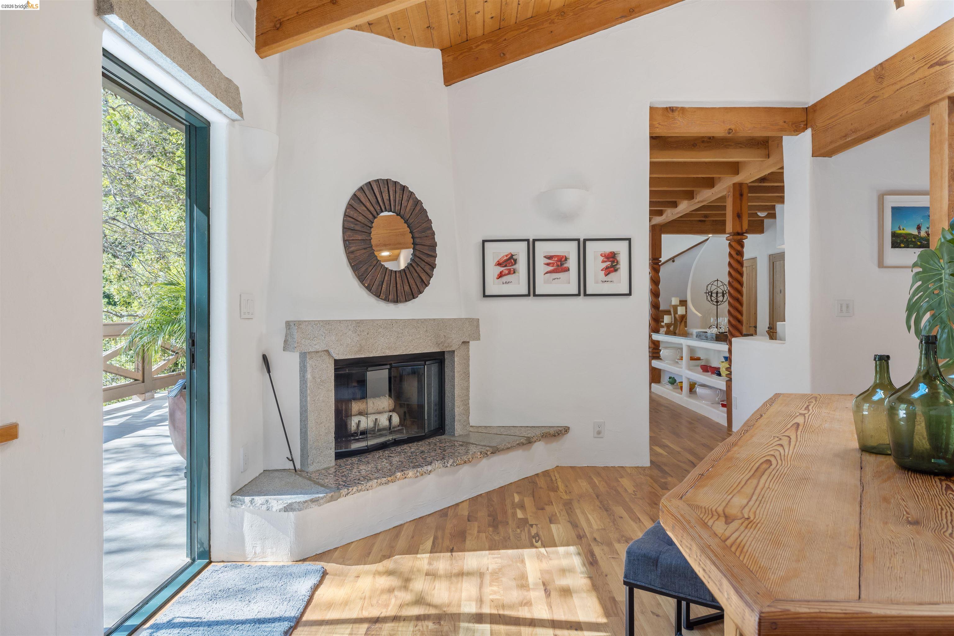 1102 Grand View Drive Berkeley, CA 94705 - Photo 17 of 50 a living room with furniture and a fireplace