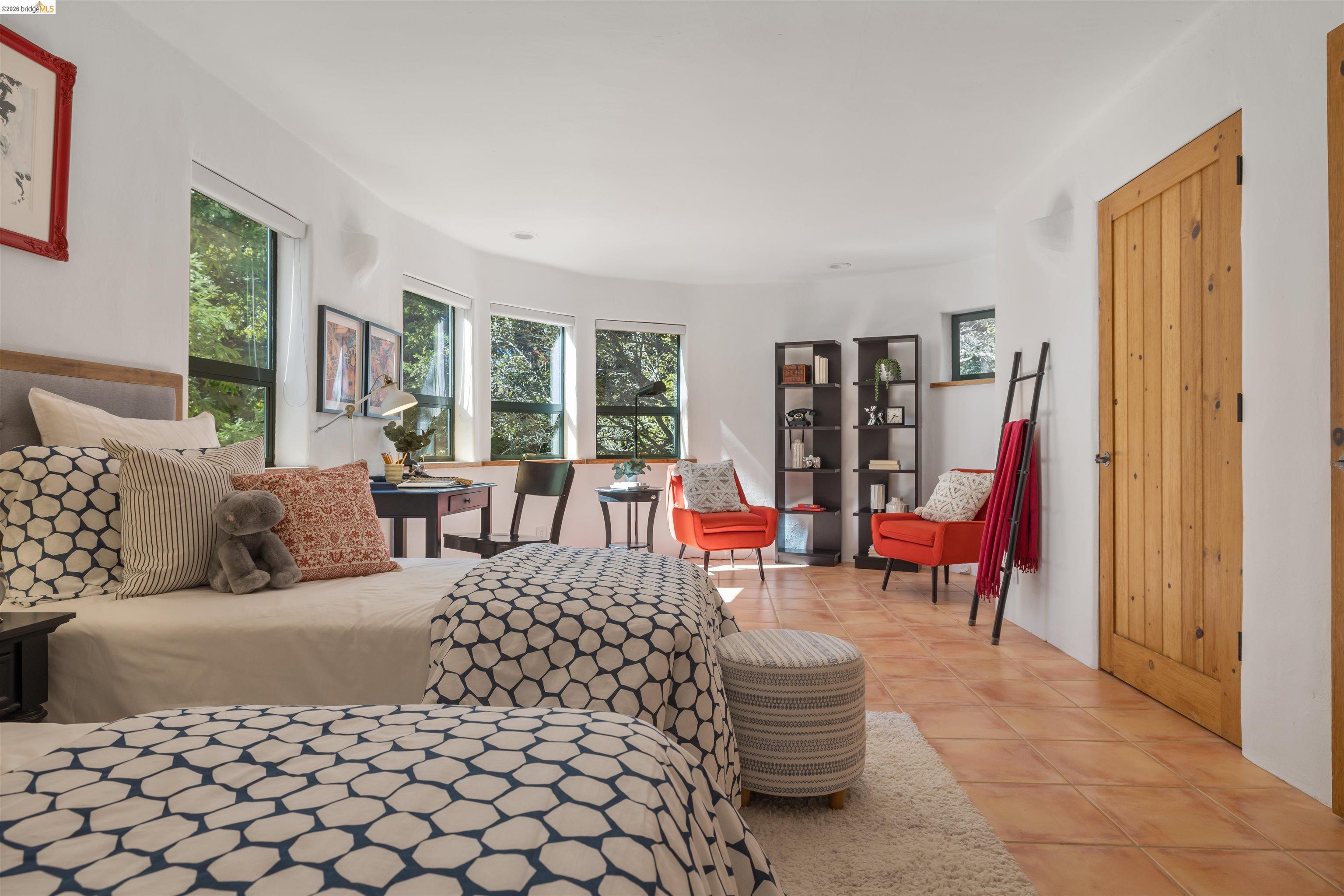 1102 Grand View Drive Berkeley, CA 94705 - Photo 35 of 50 a living room with furniture and a rug