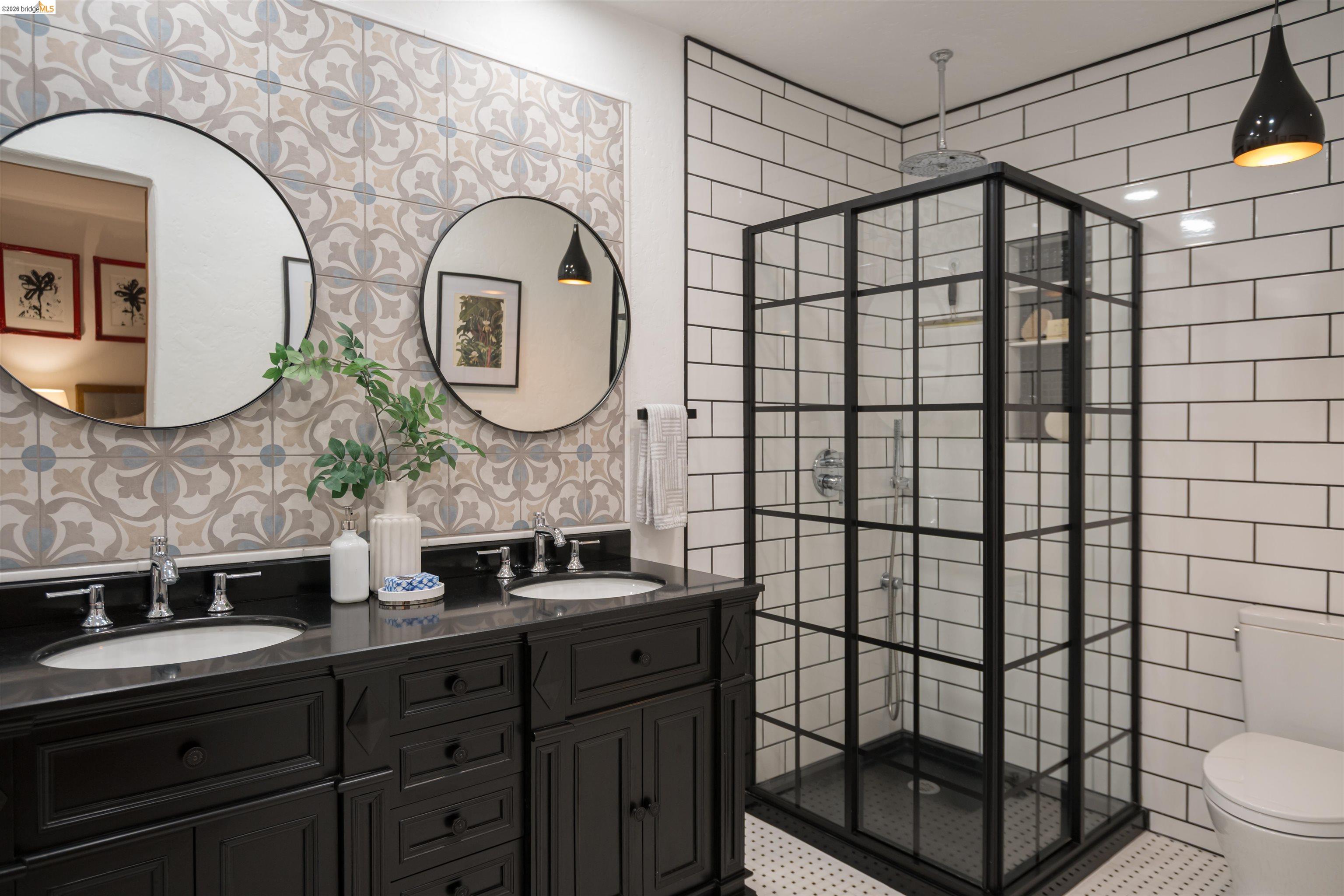 1102 Grand View Drive Berkeley, CA 94705 - Photo 37 of 50 a bathroom with a sink a toilet and shower