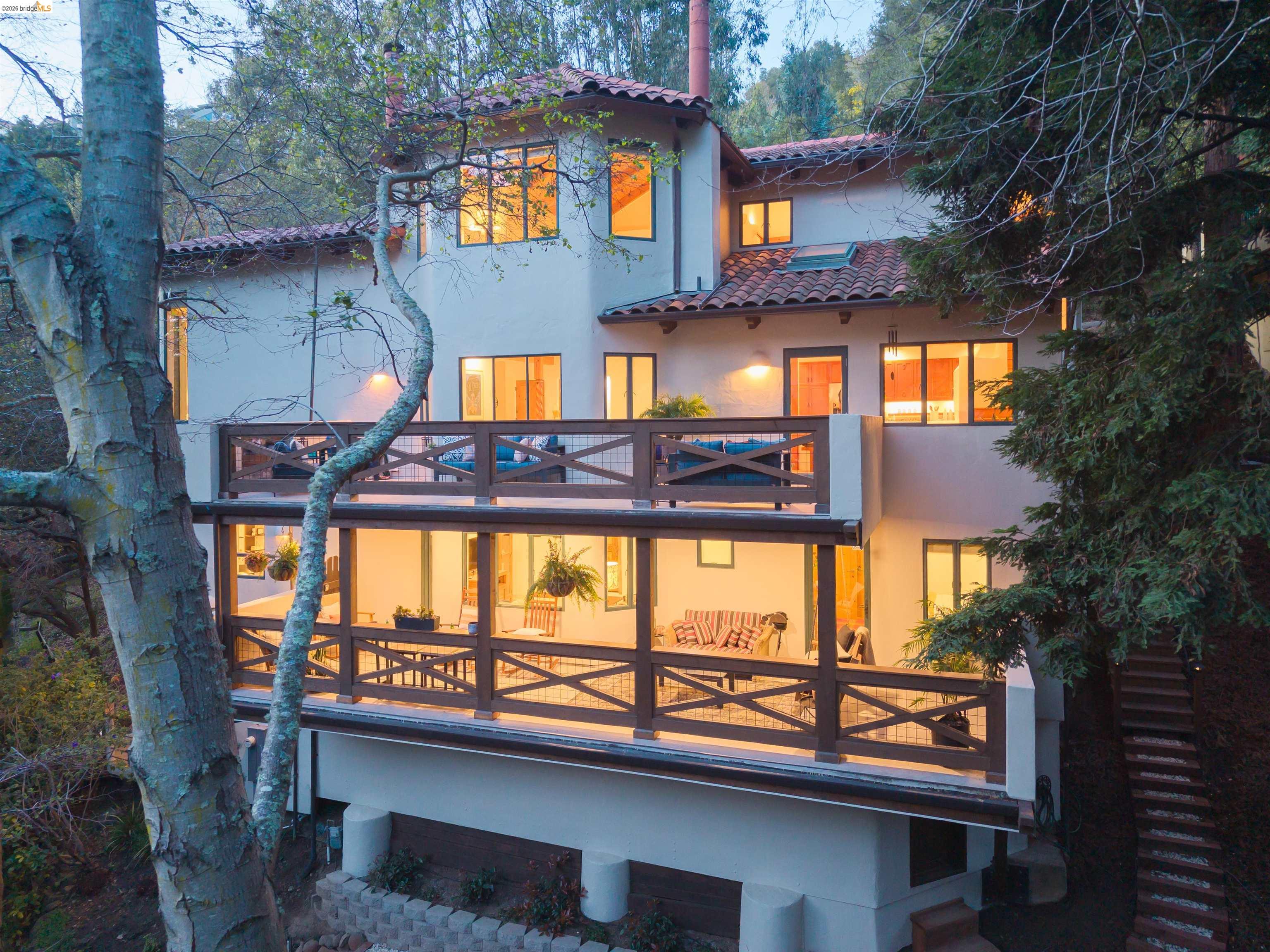 1102 Grand View Drive Berkeley, CA 94705 - Photo 48 of 50 a view of a building with a large tree