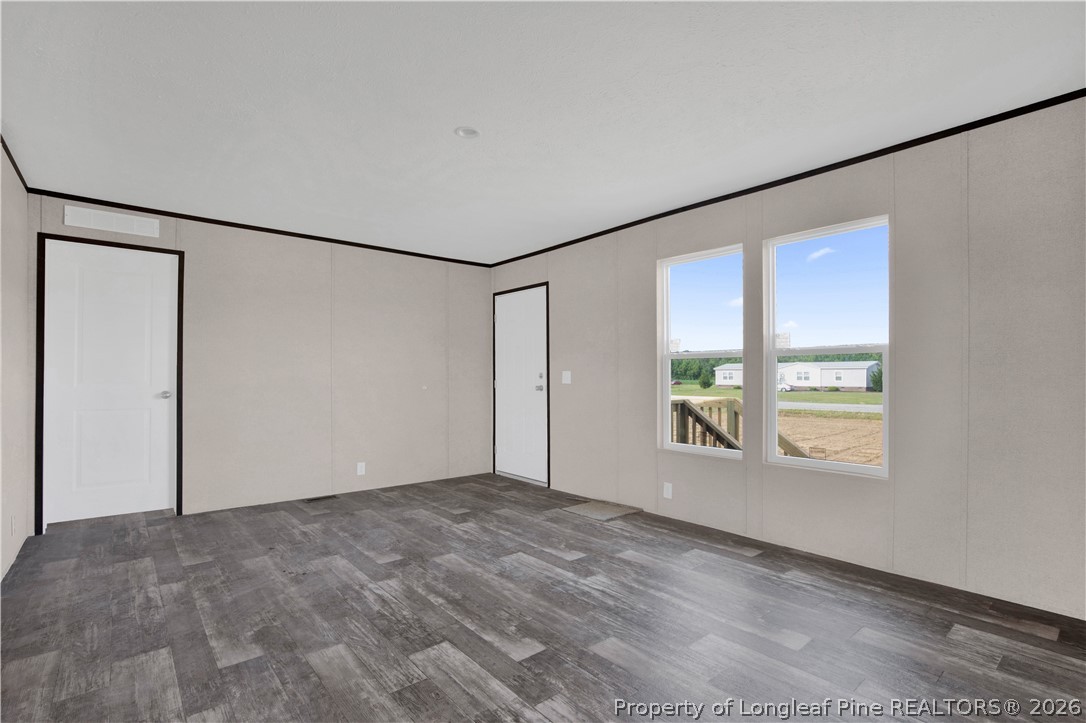 6309 Deep Branch Road Pembroke, NC 28372 - Photo 5 of 32 a view of an empty room with a window