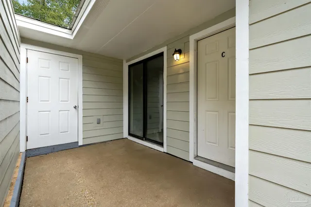 a kitchen with a stove and a refrigerator