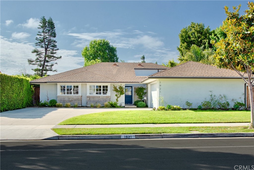 a view of a house with a swimming pool