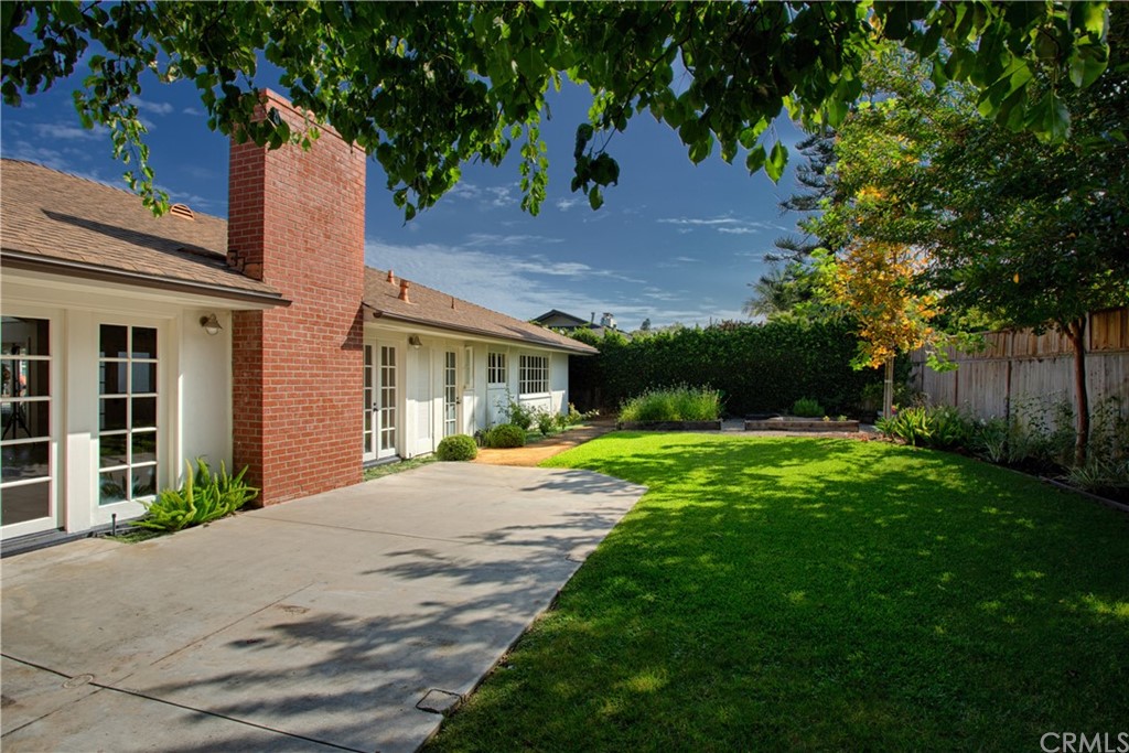 1921 Mariners Drive Newport Beach, CA 92660 - Photo 16 of 17 a front view of a house with yard and green space