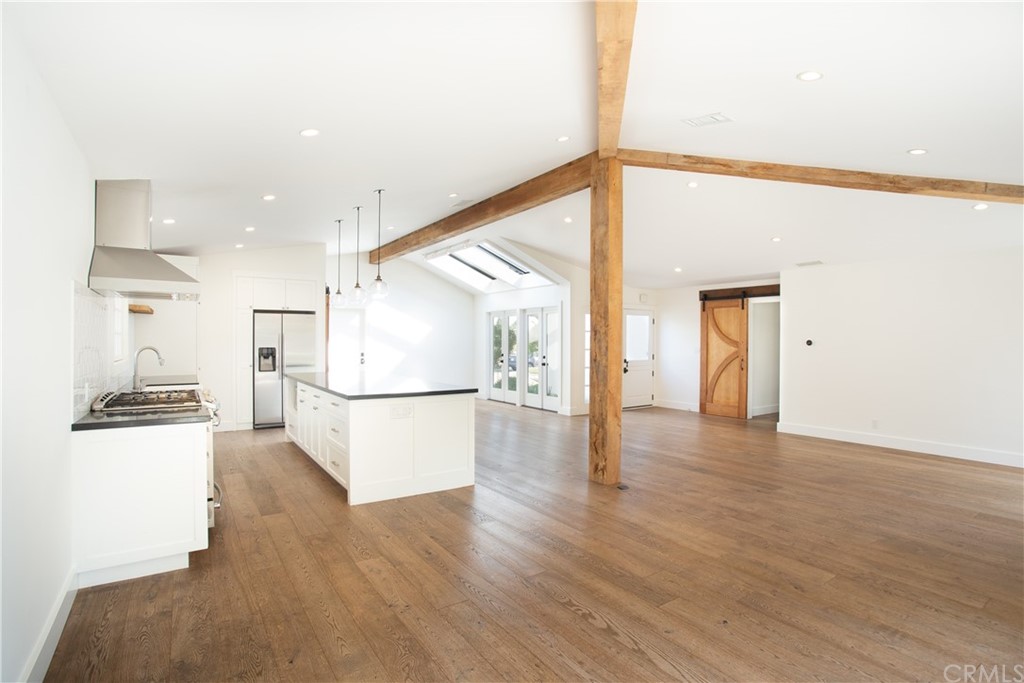 1921 Mariners Drive Newport Beach, CA 92660 - Photo 5 of 17 a view of a kitchen with a refrigerator and a window
