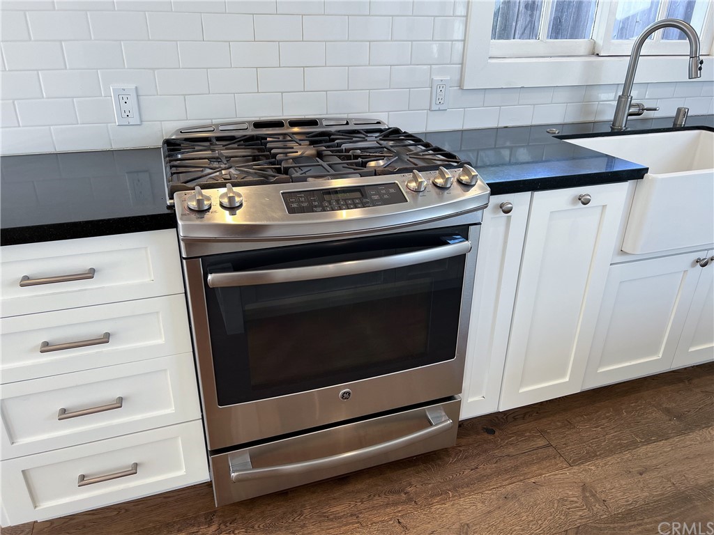 1921 Mariners Drive Newport Beach, CA 92660 - Photo 8 of 17 a stove top oven sitting inside of a kitchen