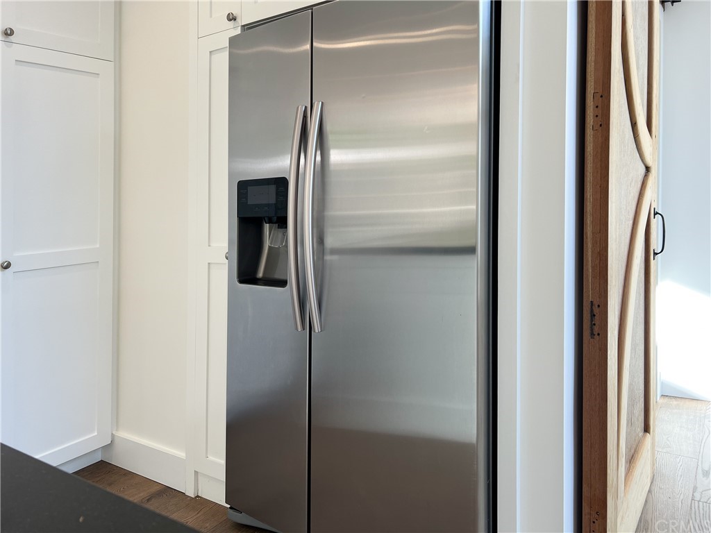 1921 Mariners Drive Newport Beach, CA 92660 - Photo 9 of 17 a bathroom with a glass shower door