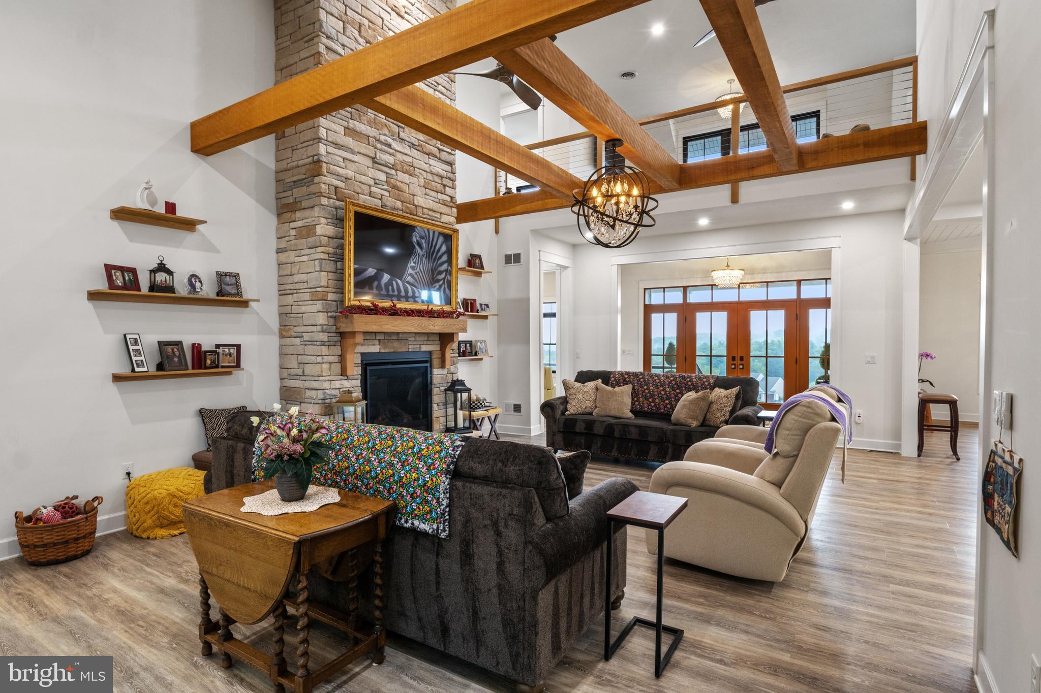 4073 Landis Road Hanover, PA 17331 - Photo 14 of 100 a living room with furniture a fireplace and a table
