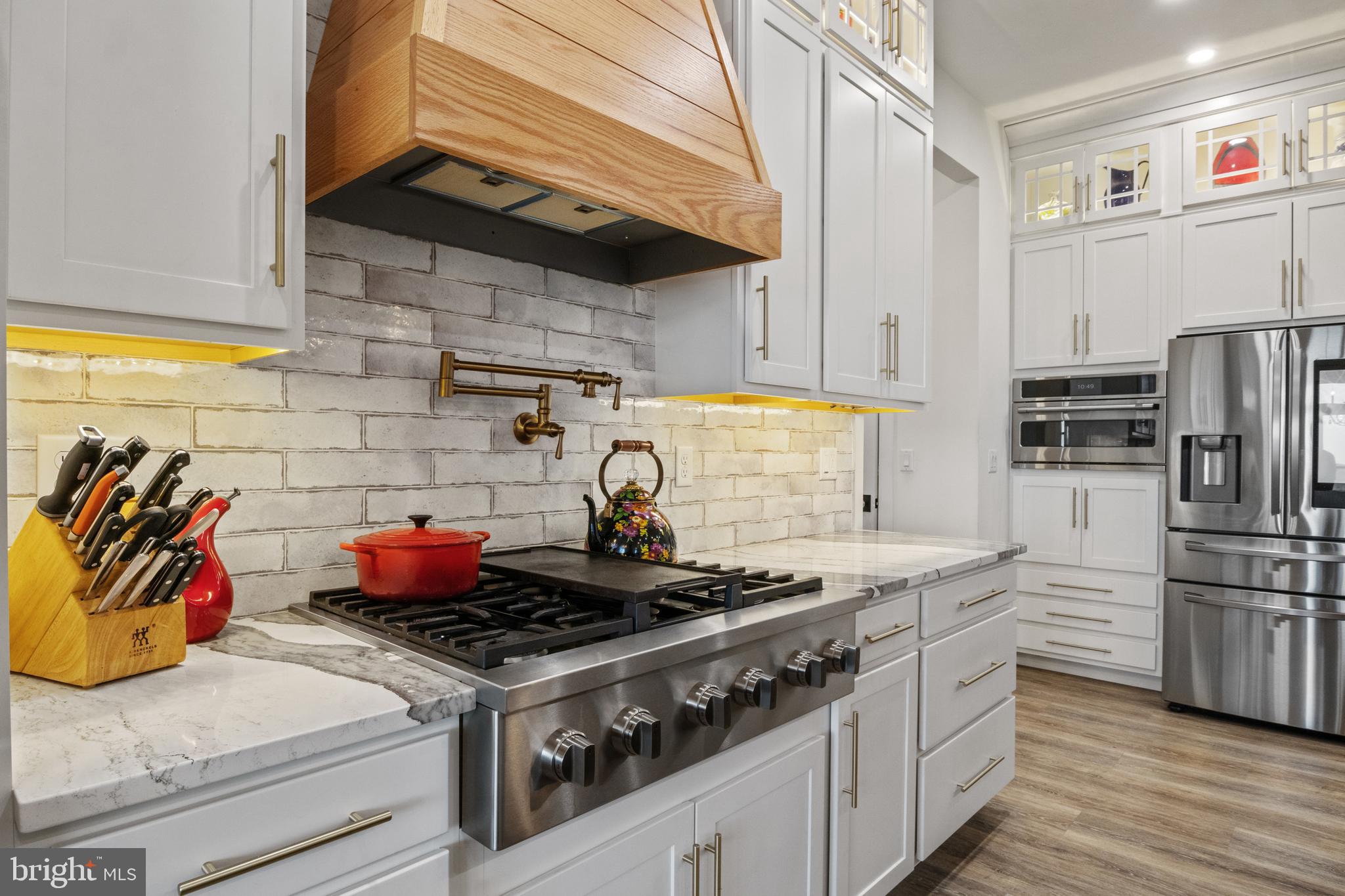 4073 Landis Road Hanover, PA 17331 - Photo 23 of 100 a kitchen with stainless steel appliances granite countertop a stove and a refrigerator