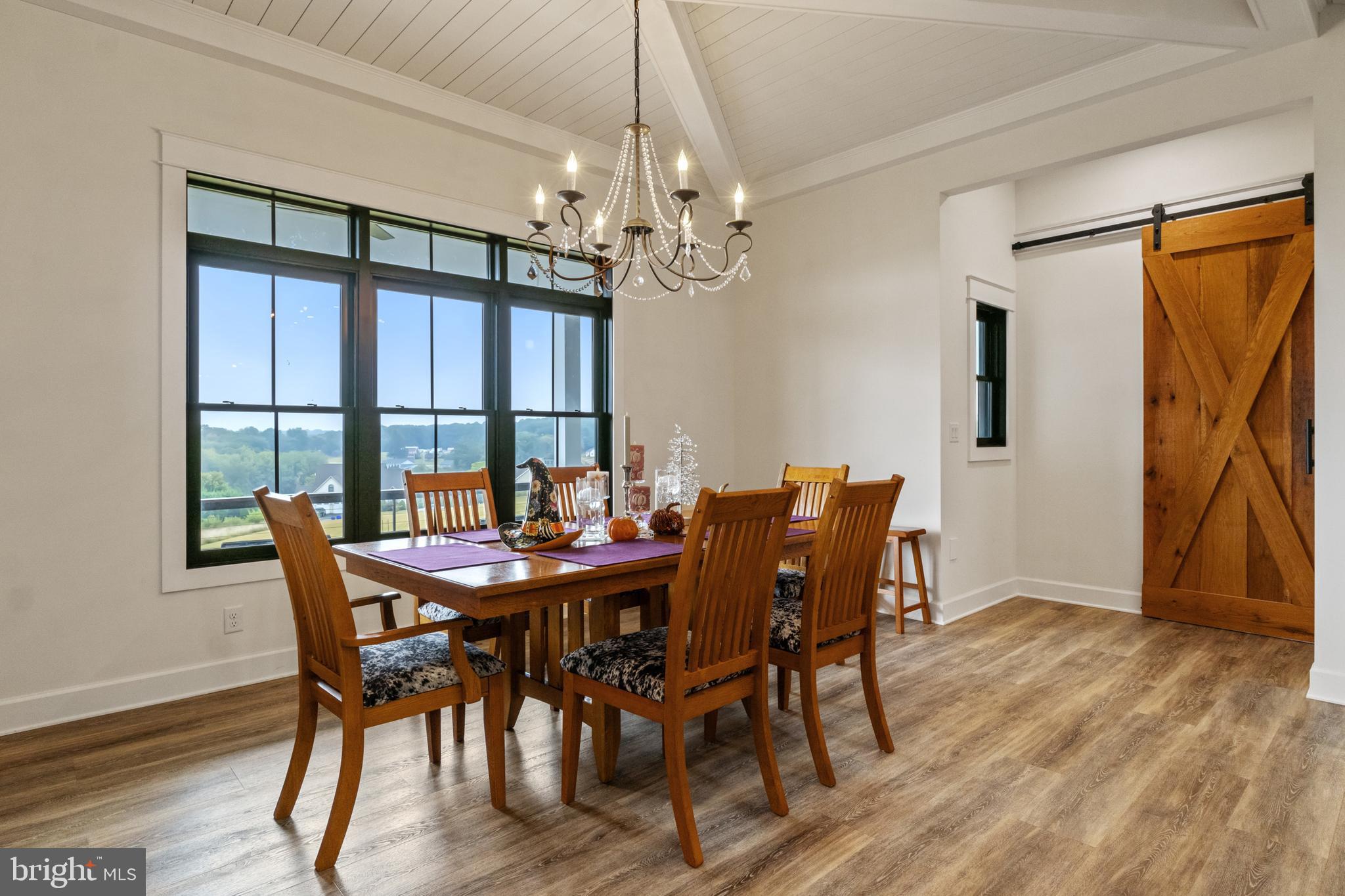 4073 Landis Road Hanover, PA 17331 - Photo 28 of 100 a view of a dining room with furniture window and wooden floor