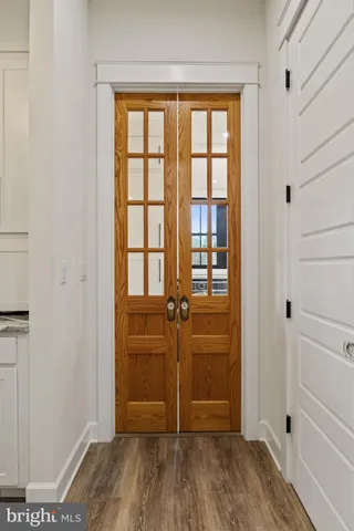 a bathroom that has a glass shower door