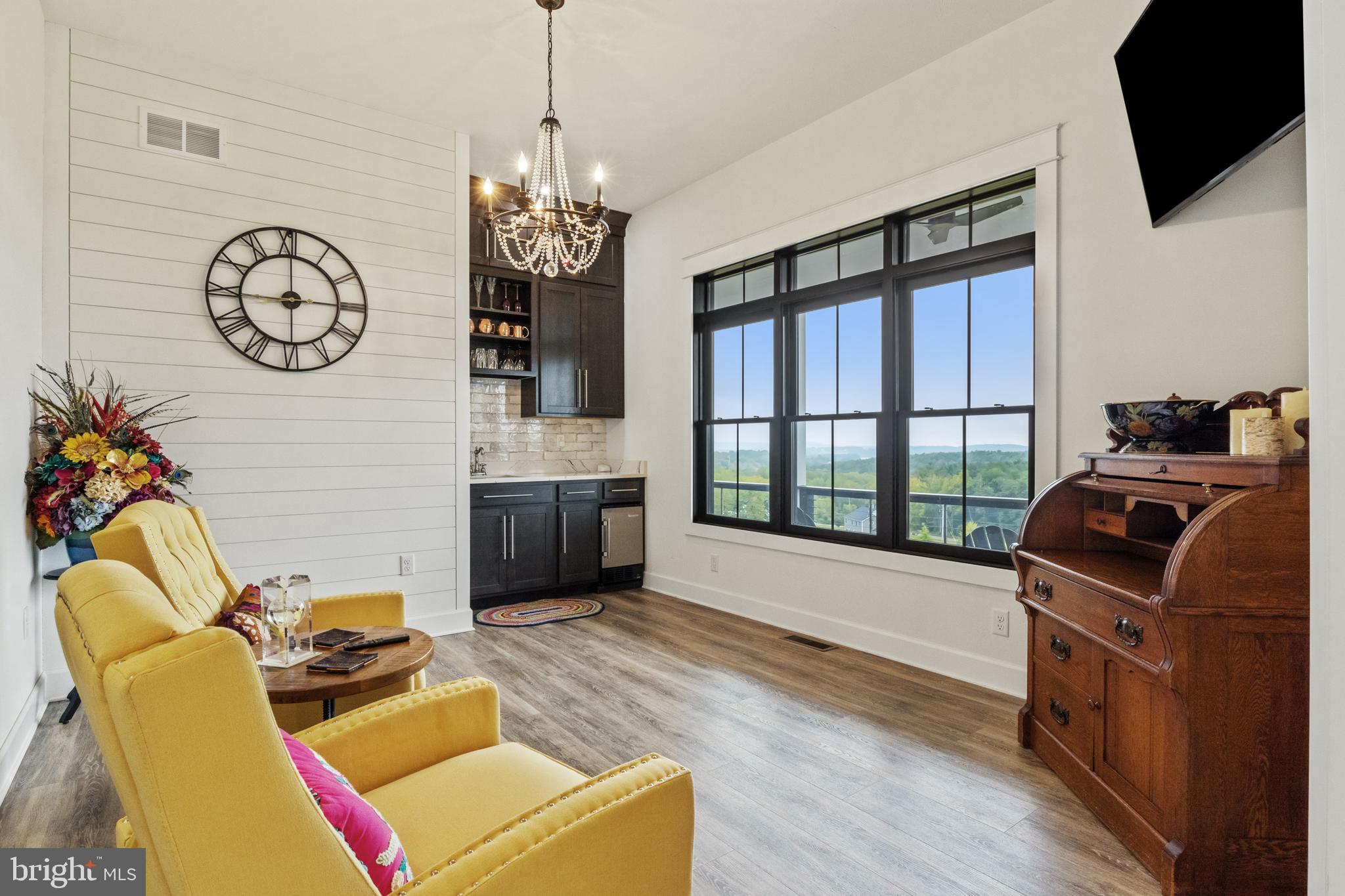 4073 Landis Road Hanover, PA 17331 - Photo 36 of 100 a living room with furniture a flat screen tv and a window