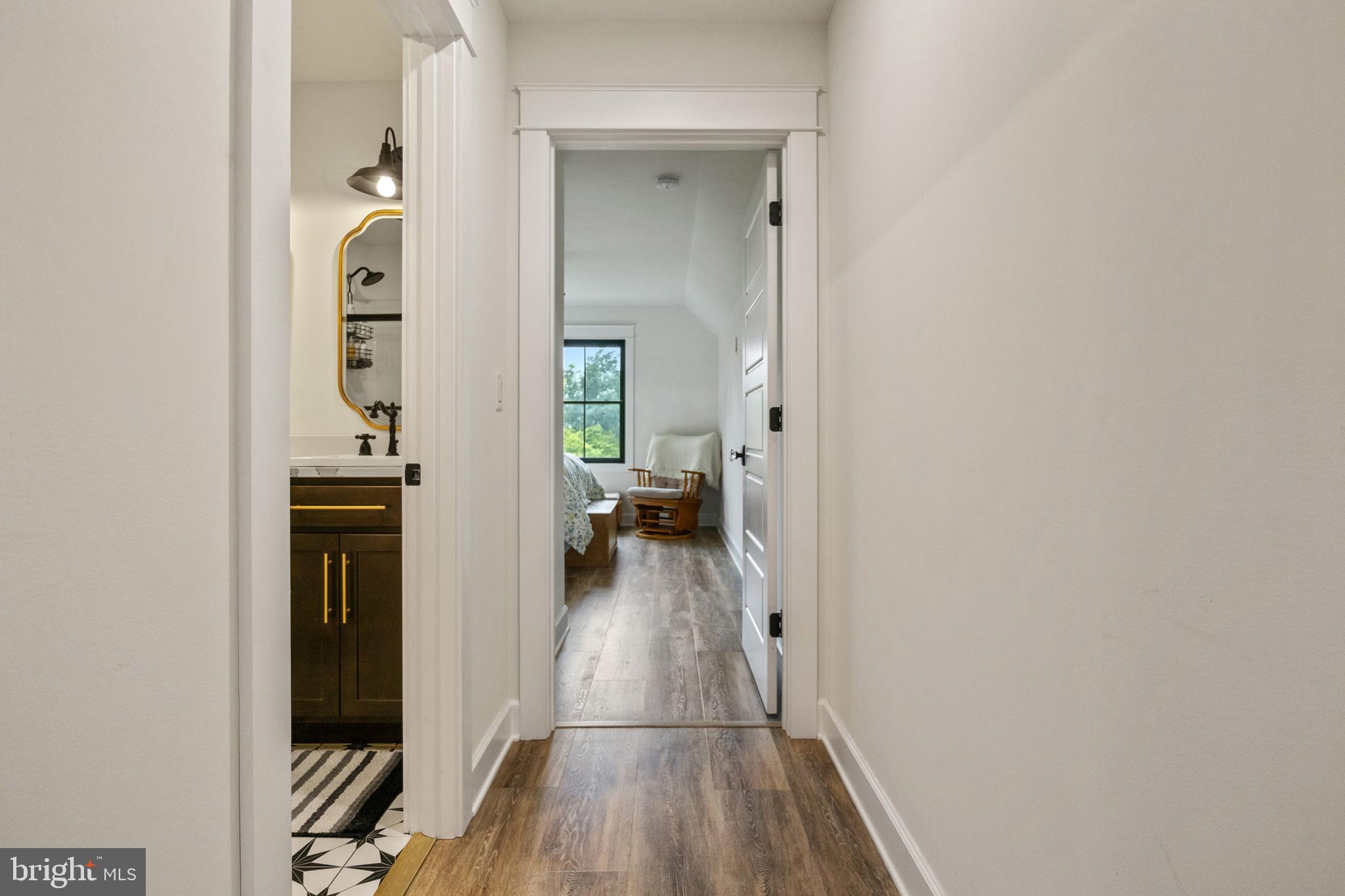 4073 Landis Road Hanover, PA 17331 - Photo 49 of 100 a view of a hallway with wooden floor and staircase