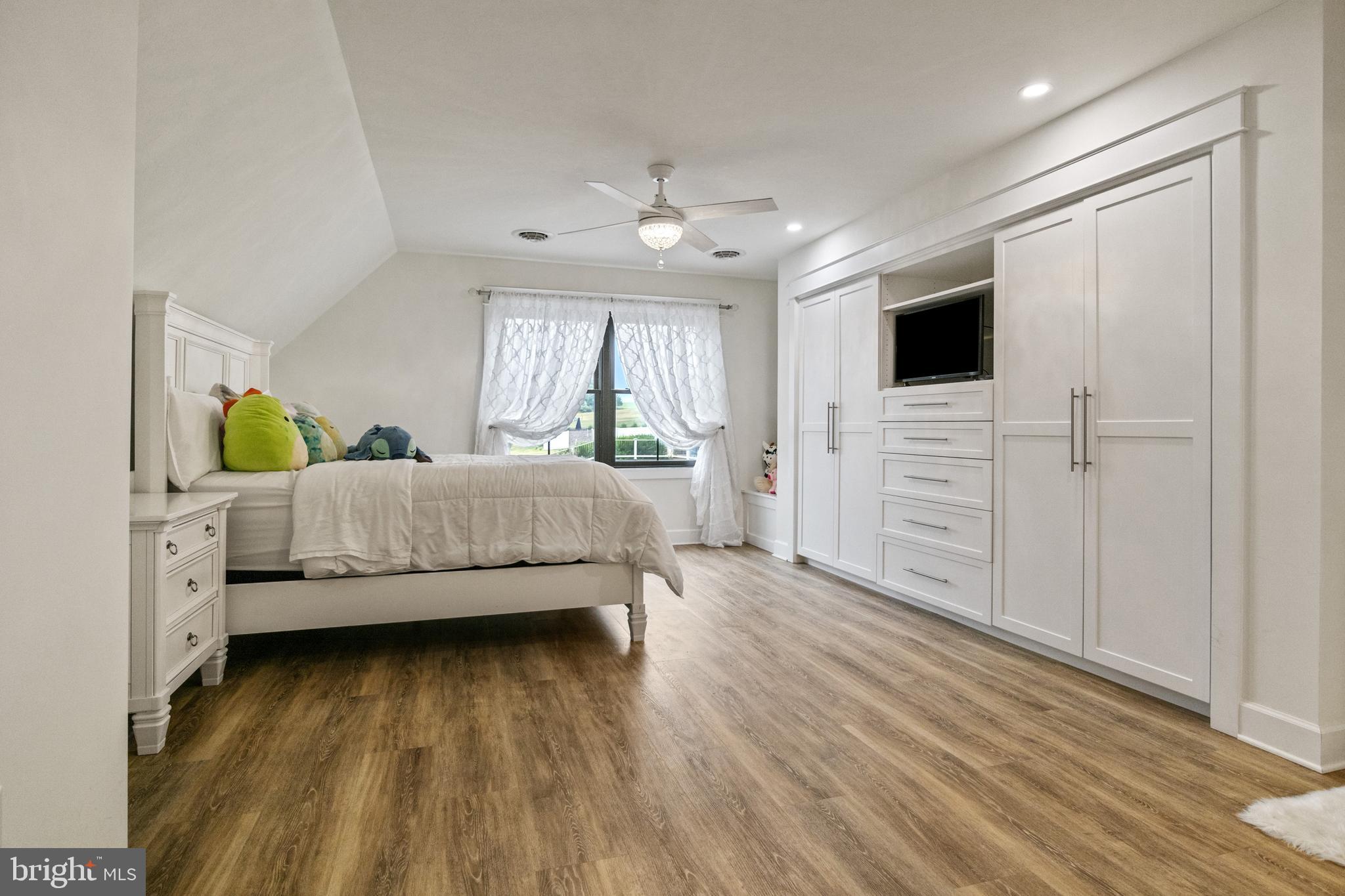 4073 Landis Road Hanover, PA 17331 - Photo 54 of 100 a bedroom with a bed and a flat tv screen