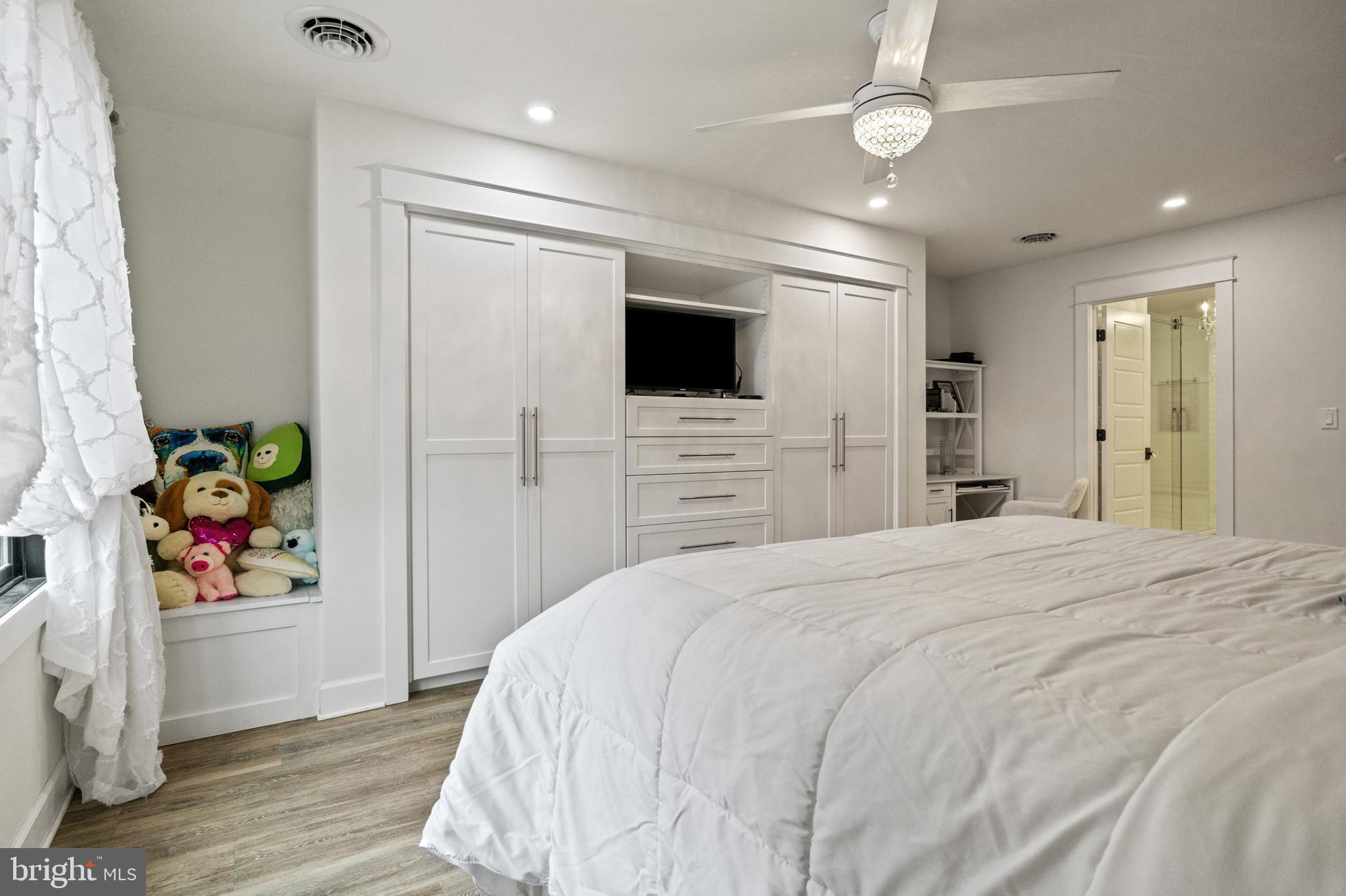 4073 Landis Road Hanover, PA 17331 - Photo 55 of 100 a spacious bedroom with a bed and a flat screen tv