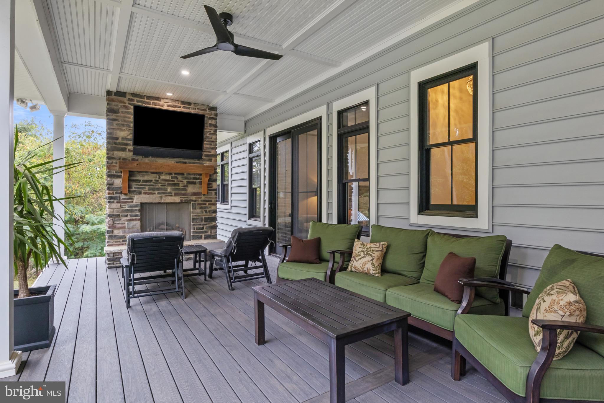 4073 Landis Road Hanover, PA 17331 - Photo 72 of 100 a living room with fireplace furniture and a flat screen tv